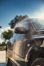 Close up of nozzle of high pressure washer used on car Royalty Free Stock Photo