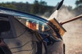 Close up of nozzle of high pressure washer used on car Royalty Free Stock Photo