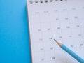 Close up, number 14 and blue pencil on 02 calendar page. Royalty Free Stock Photo