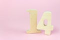 Close-Up Of Number 14 On pink Table. Valentines day concept. Calendar reminder event concept Royalty Free Stock Photo