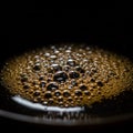 Close-up of numerous bubbles on a dark liquid surface, likely a carbonated beverage Royalty Free Stock Photo
