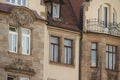 Close-up of numerous windows in an old stone building in Bamberg, Germany