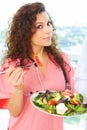 Close-up of a nurse holding salad Royalty Free Stock Photo