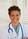 Close up of nurse in scrubs and lab coat Royalty Free Stock Photo