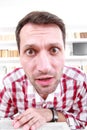 Close up of nutty confused and shocked professor or student with Royalty Free Stock Photo