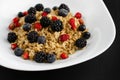 Close up of Oatmeal porridge with berries. Healthy breakfast. Royalty Free Stock Photo