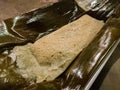 Close up of a Oaxacan style Mexican tamale on a banana leaf. Mexican street food, Travel in Mexico