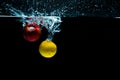 Close-up. object shooting. apple with lemon in water