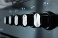 Close-up of a gas stove control panel knobs in a home kitchen Royalty Free Stock Photo