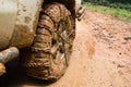 Close up of off road car tire with chain on it Royalty Free Stock Photo