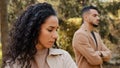 Close up offended upset curly girl in background angry guy family quarrel woman turns away from man hispanic couple Royalty Free Stock Photo