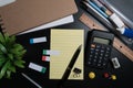 Close up of office business supplies on black background in studio. Basic and classic office business supplies.