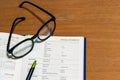 Close up office desk with open book information page Royalty Free Stock Photo