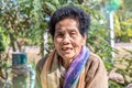 Close-up of old Asian woman face with wrinkles elderly senior.smiling happiness with a few broken teeth Royalty Free Stock Photo