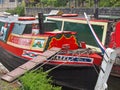 A close up of old barges at the narrow boats club gathering held on the may bank holiday on the rochdale canal at hebden bridge in Royalty Free Stock Photo