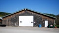 Close Up of Old Barn or Warehouse in Country Setting - Hangar Storage Building Royalty Free Stock Photo