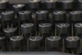 Close up of an old black typewriter keyboard with round keys Royalty Free Stock Photo
