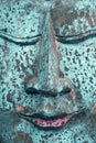 Close-up of old blue wooden buddha head Royalty Free Stock Photo