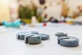 Close up of old bobbin cases laid on table Royalty Free Stock Photo