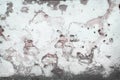 Old brick white paint with decayed patterns abstract on concrete weathered wall for background Royalty Free Stock Photo