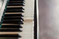 Close-up on old broken piano keyboard. Vintage instruments