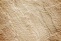 Old brown sandstone background in seamless line shaped patterns nature texture Royalty Free Stock Photo