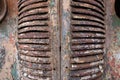 Close-up of an old car radiator from the front. The car is old. The radiator is weathered. The paint is peeling off. The rust Royalty Free Stock Photo