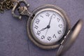 Close up of old clock on table, deadline concept. Royalty Free Stock Photo