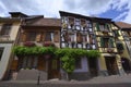 Close up of old colorful half-timbered houses .