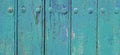 close up old door wooden texture background, door with antique rivets, door made of wood material, door painted green and blue Royalty Free Stock Photo