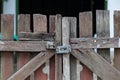 Close up of old farm gate with the metal door latch Royalty Free Stock Photo