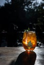 Close-up of old-fashioned cocktail on wooden table Royalty Free Stock Photo