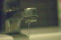 Close up old faucet with water drop background. Royalty Free Stock Photo