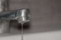 Close up old faucet with water drop background. Royalty Free Stock Photo