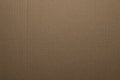 Close up old grainy decorative light brown vintage rough sheet of carton cardboard paper texture or background Royalty Free Stock Photo