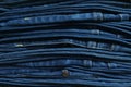 Close-up old Jeans trousers stack background texture Royalty Free Stock Photo