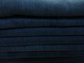 Close-up old Jeans trousers stack background texture Royalty Free Stock Photo