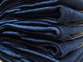 Close-up old Jeans trousers stack background texture Royalty Free Stock Photo