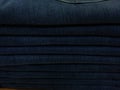 Close-up old Jeans trousers stack background texture Royalty Free Stock Photo