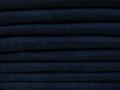 Close-up old Jeans trousers stack background texture Royalty Free Stock Photo