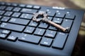 Close up old key and push-button the computer keyboard Royalty Free Stock Photo