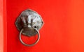 Close up Old knocker on red door in thai temple Royalty Free Stock Photo