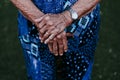 Close up of old lady hands holding a stick outdoors Royalty Free Stock Photo