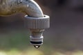 Close Up of Old Leaking Faucet with Pipe Connection Royalty Free Stock Photo