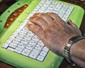 Close up of old male hand on keyboard Royalty Free Stock Photo