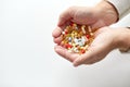 Close up of old man hands holding medicine Royalty Free Stock Photo