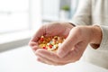 Close up of old man hands holding medicine Royalty Free Stock Photo