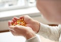 Close up of old man hands holding medicine Royalty Free Stock Photo