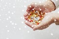 Close up of old man hands holding medicine Royalty Free Stock Photo