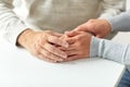 Close up of old man and young woman holding hands Royalty Free Stock Photo